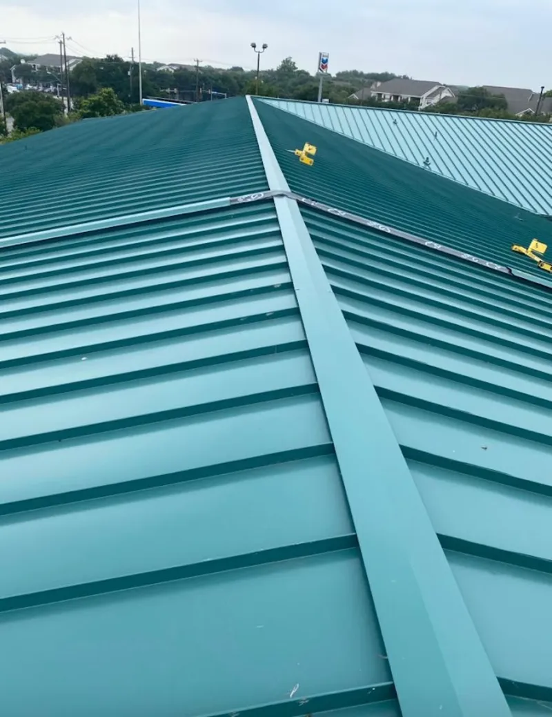 Green commercial metal roof ridge and valley for Metal Roof Repair in Cody