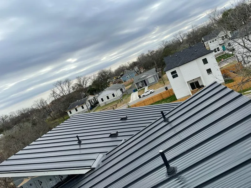 Standing seam metal roof panels with vents for Skylight Repair in Cody